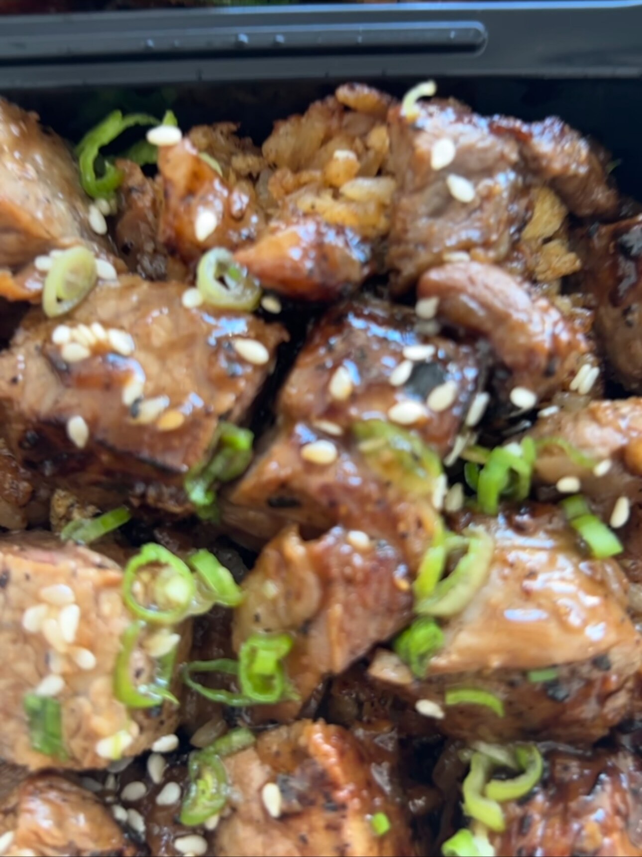 Ribeye cubes with sesame and scallions